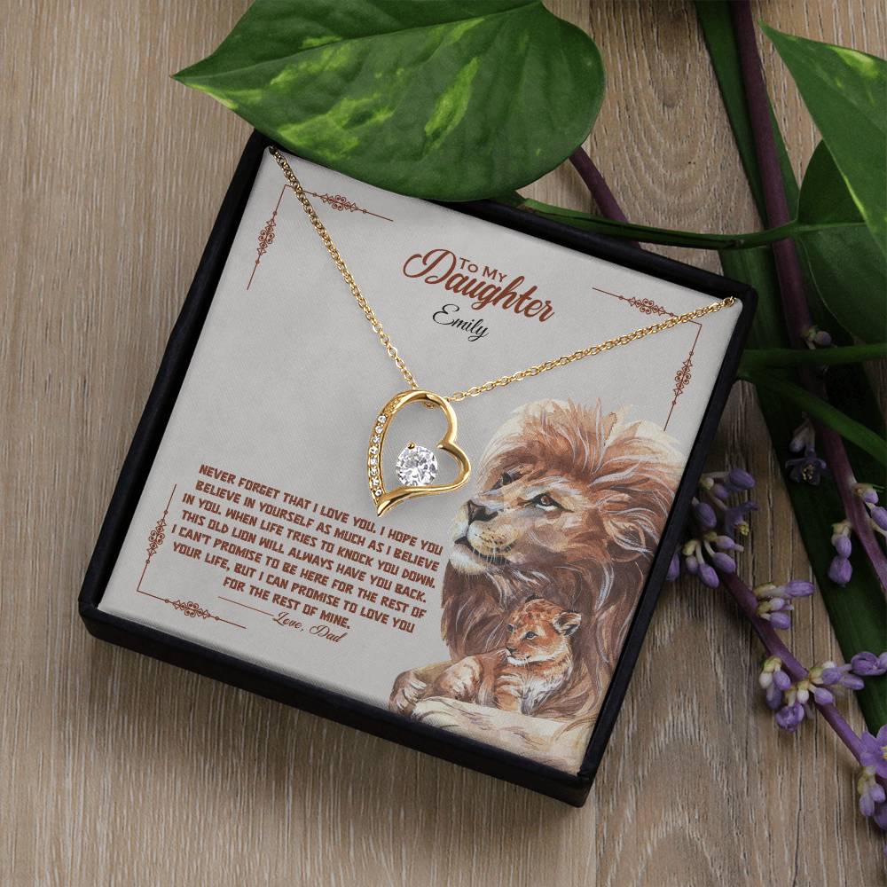 a gift box with a stainless steel heart shapped pedant necklace with a large cz diamond and small ca chip diamonds on the perimeter A