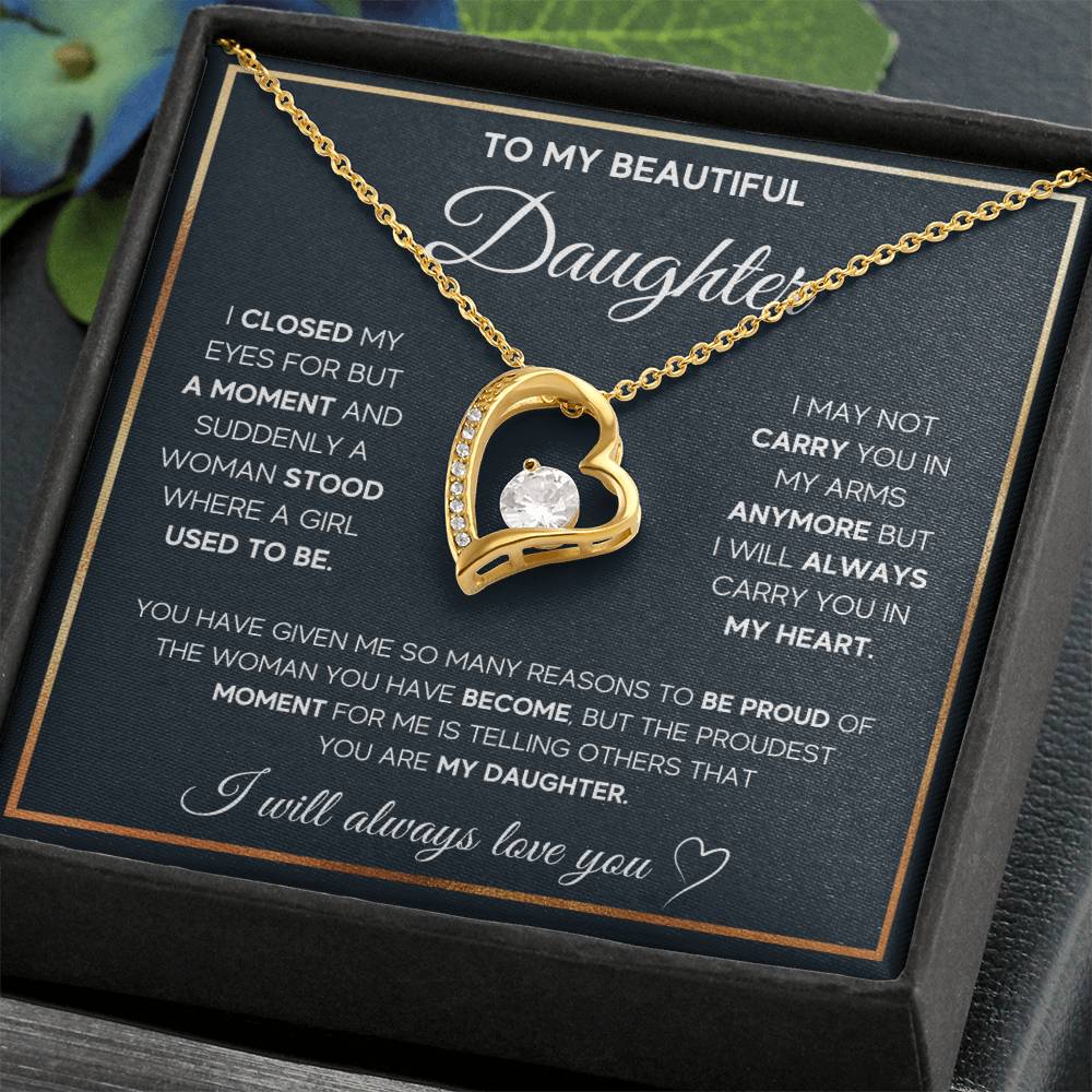 The dazzling Forever Love Necklace is sure to make her heart melt! This necklace features a stunning 6.5mm CZ crystal surrounded by a polished heart pendant embellished with smaller crystals to add extra sparkle and shine. Beautifully crafted with either a white gold or yellow gold finish, be sure to give her a classic gift she can enjoy everyday.