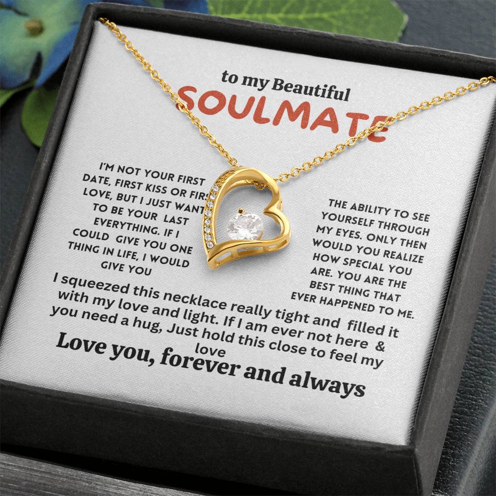 Necklace on a gift card, showcasing a 6.5mm round cut cubic zirconia stone in 18k yellow gold finish, with pendant dimensions of 0.8 inches in height and 0.7 inches in width, adjustable chain length from 18 to 22 inches, and a lobster clasp.