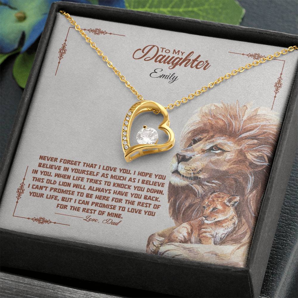 a gift box with a stainless steel heart shapped pedant necklace with a large cz diamond and small ca chip diamonds on the perimeter A