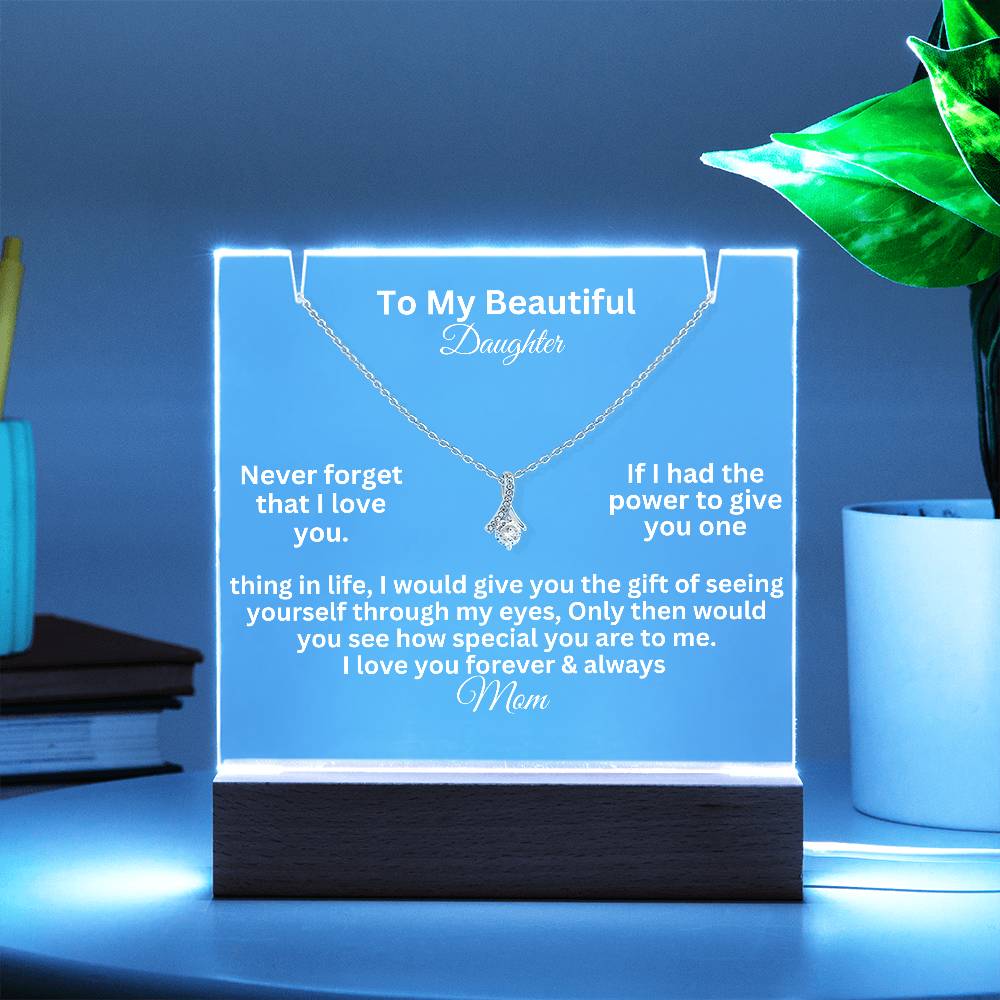 alluring beauty test white text on a  clear acrylic