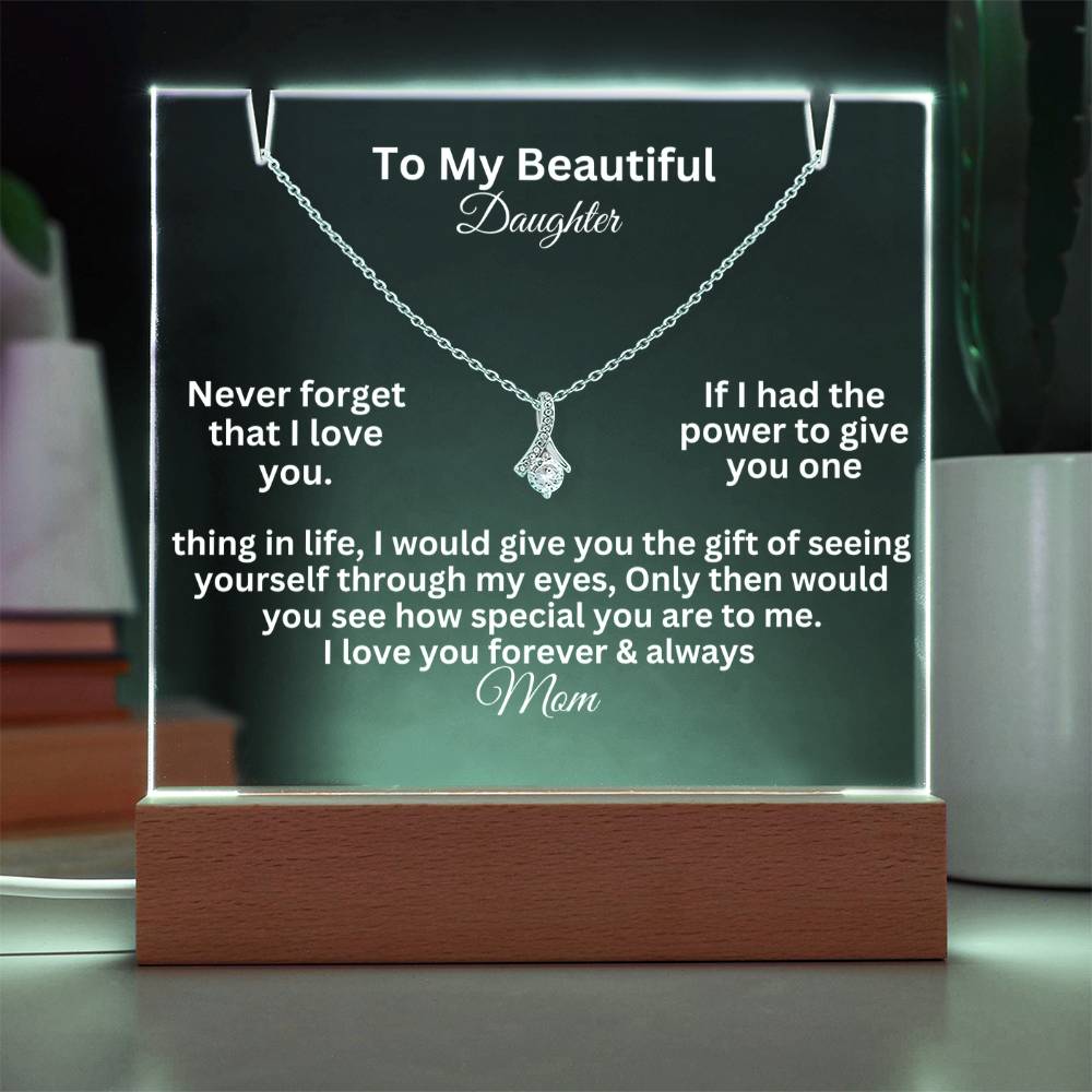 alluring beauty test white text on a  clear acrylic