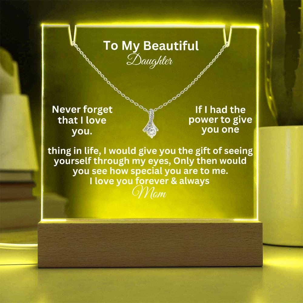 alluring beauty test white text on a  clear acrylic