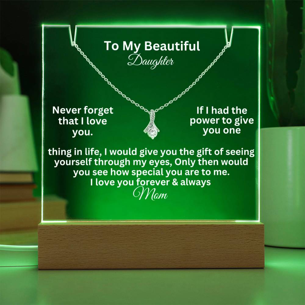alluring beauty test white text on a  clear acrylic