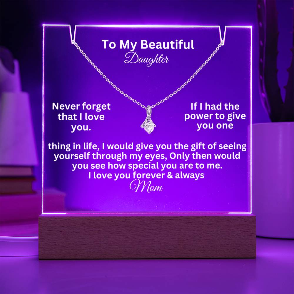 alluring beauty test white text on a  clear acrylic