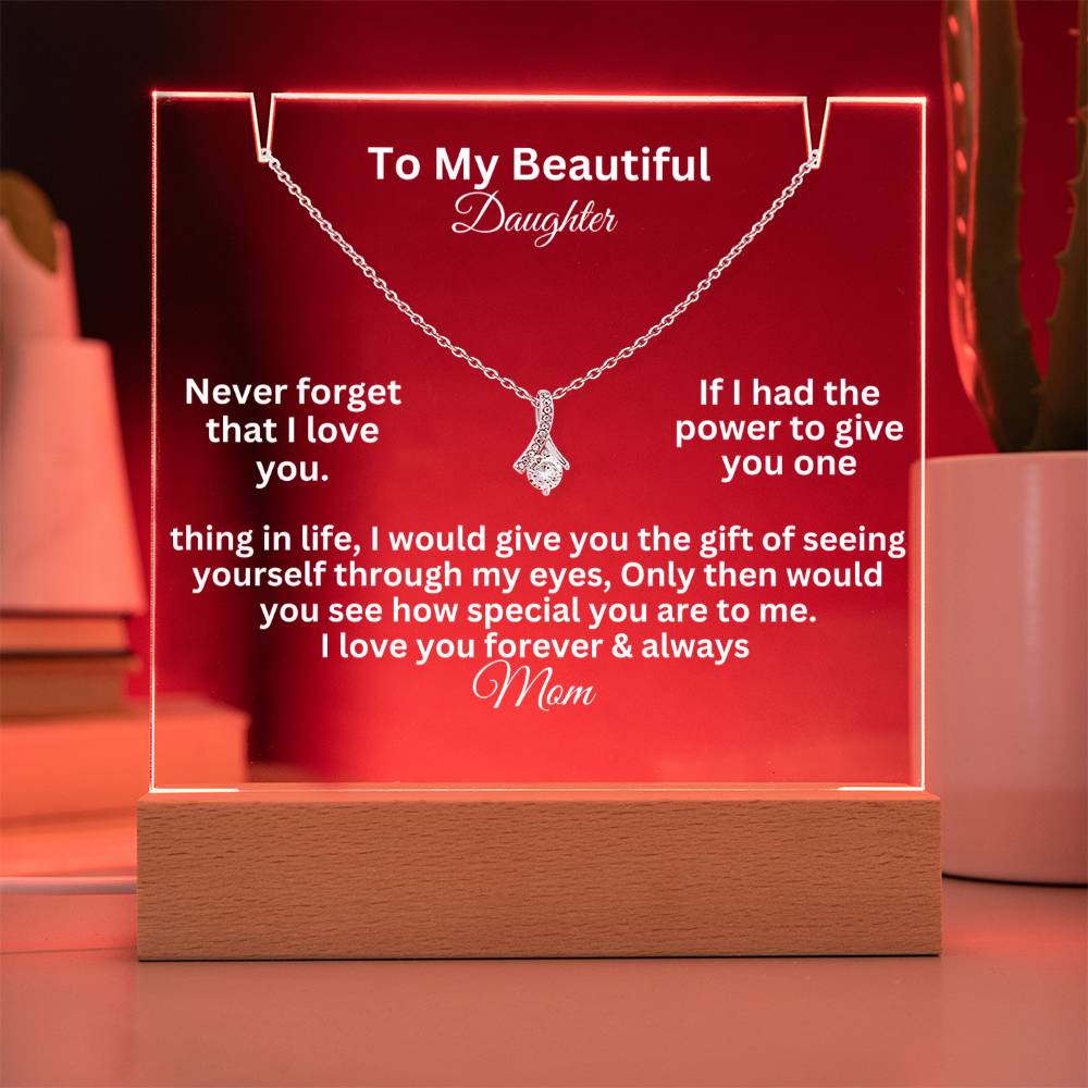 alluring beauty test white text on a  clear acrylic