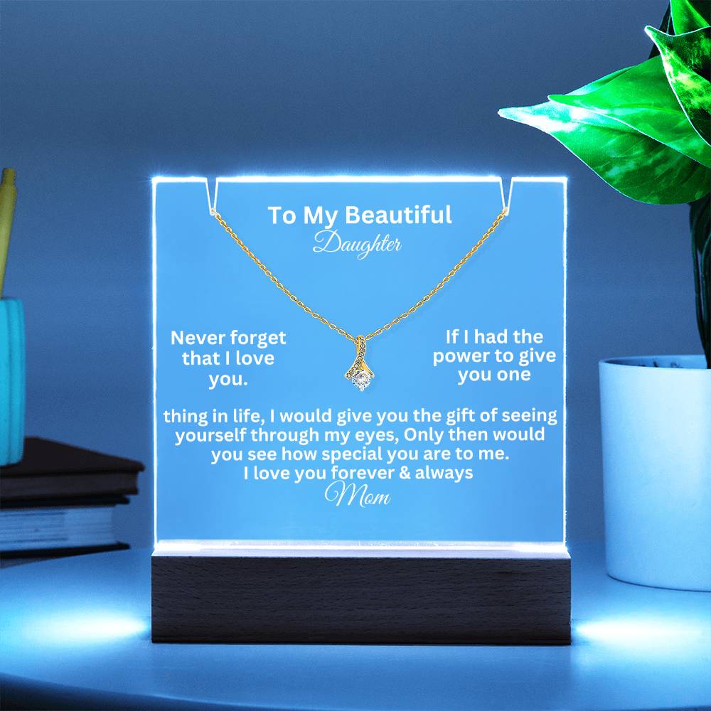 alluring beauty test white text on a  clear acrylic