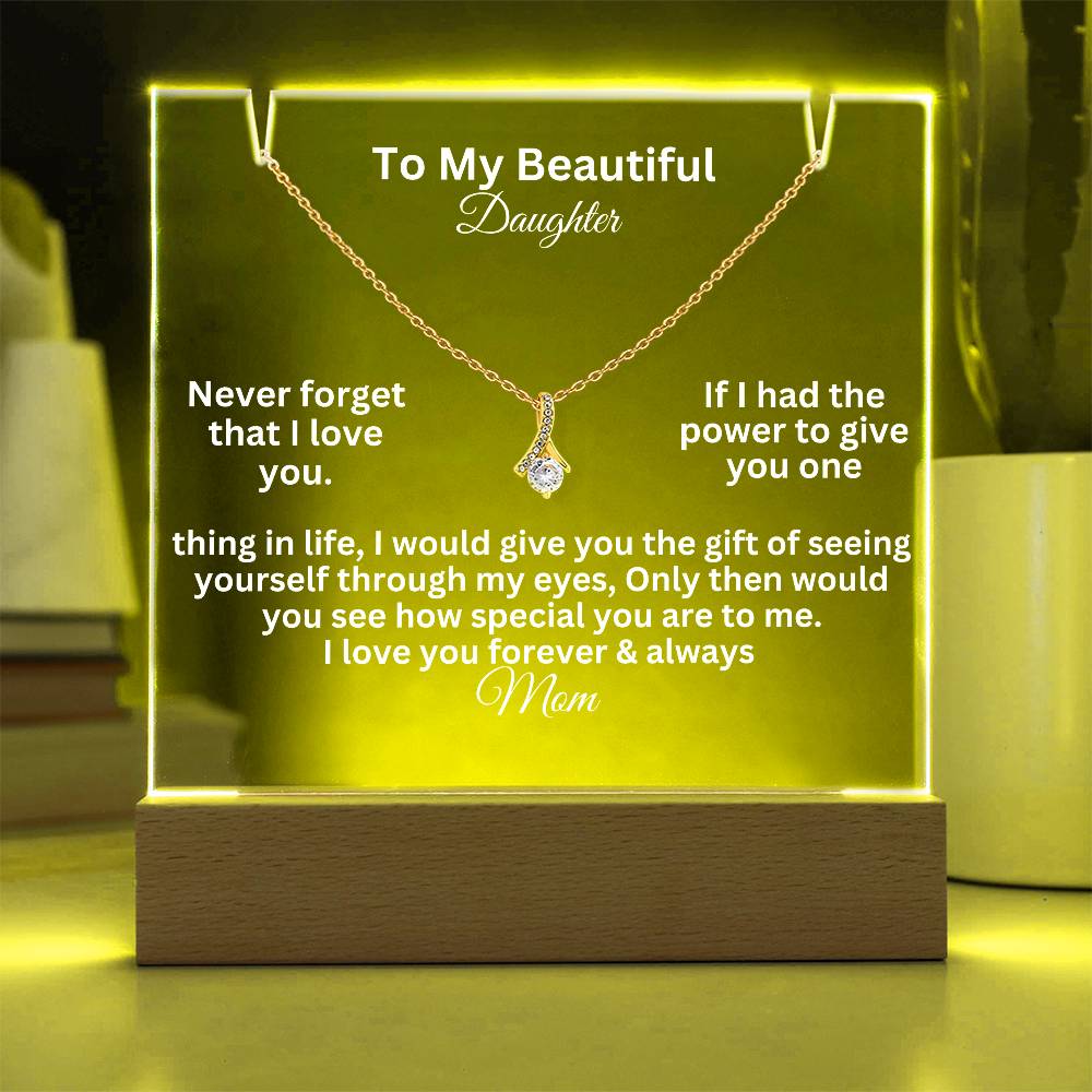 alluring beauty test white text on a  clear acrylic