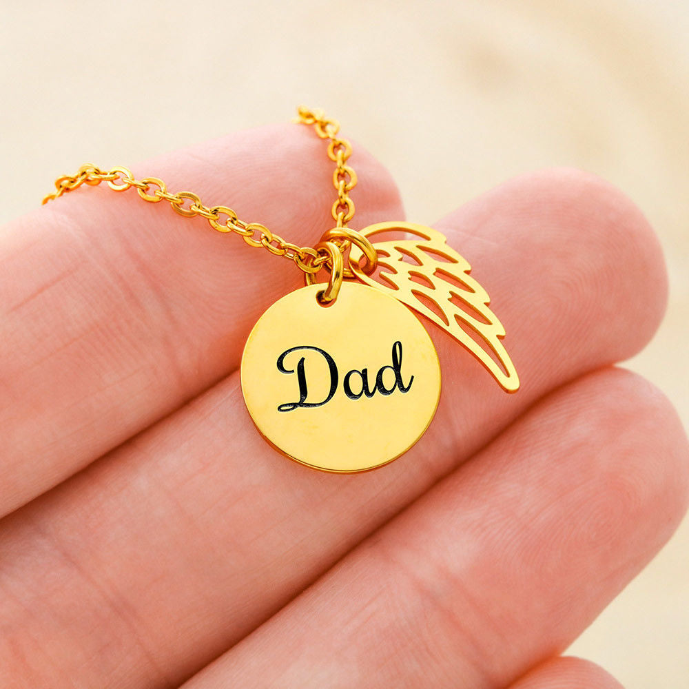 Message card with a memorial necklace Dad Product specifications: Polished Stainless Steel and 18k Yellow Gold over Stainless Steel. Pendant Dimensions, Circle 0.5" (13mm), Wing 0.625" (10mm) Adjustable 18"-22" cable chain Lobster clasp closure.
