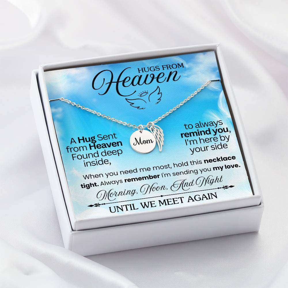 Message card with a memorial necklace Dad Product specifications: Polished Stainless Steel and 18k Yellow Gold over Stainless Steel. Pendant Dimensions, Circle 0.5" (13mm), Wing 0.625" (10mm) Adjustable 18"-22" cable chain Lobster clasp closure.