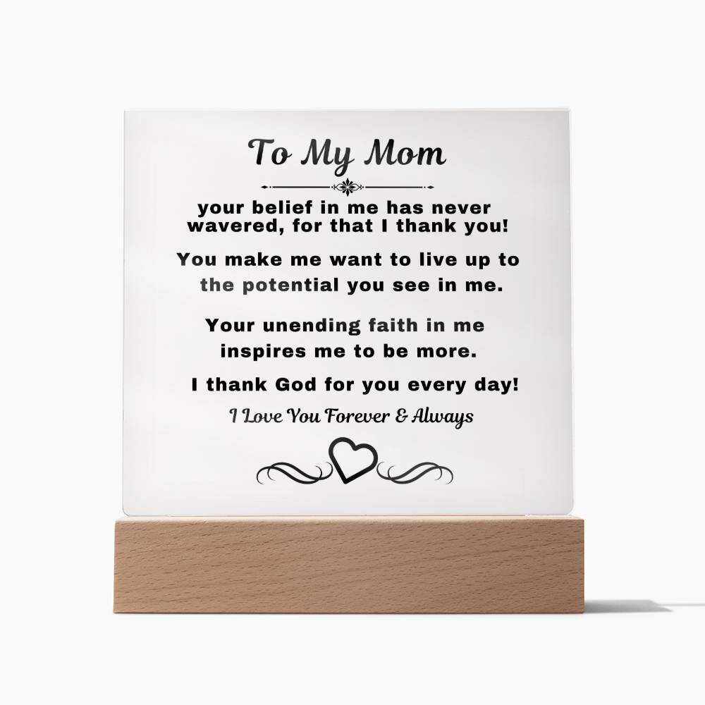 "An elegant Premium Acrylic Plaque gift for Mom displayed on a sleek Wooden Base, featuring heartfelt custom engraving to celebrate a special occasion or express your love and appreciation."