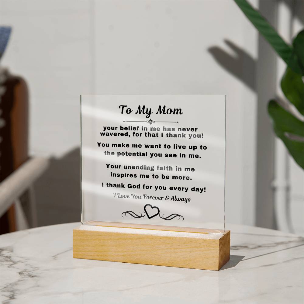 "An elegant Premium Acrylic Plaque gift for Mom displayed on a sleek Wooden Base, featuring heartfelt custom engraving to celebrate a special occasion or express your love and appreciation."