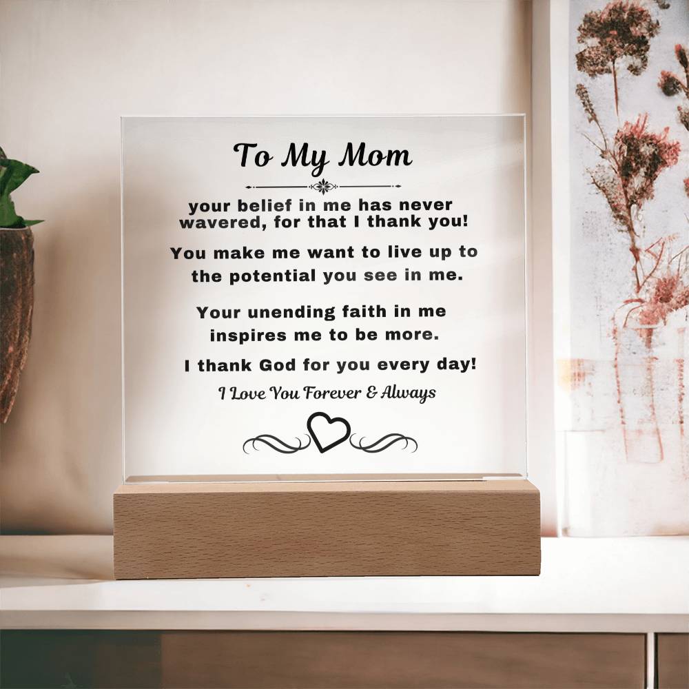 "An elegant Premium Acrylic Plaque gift for Mom displayed on a sleek Wooden Base, featuring heartfelt custom engraving to celebrate a special occasion or express your love and appreciation."