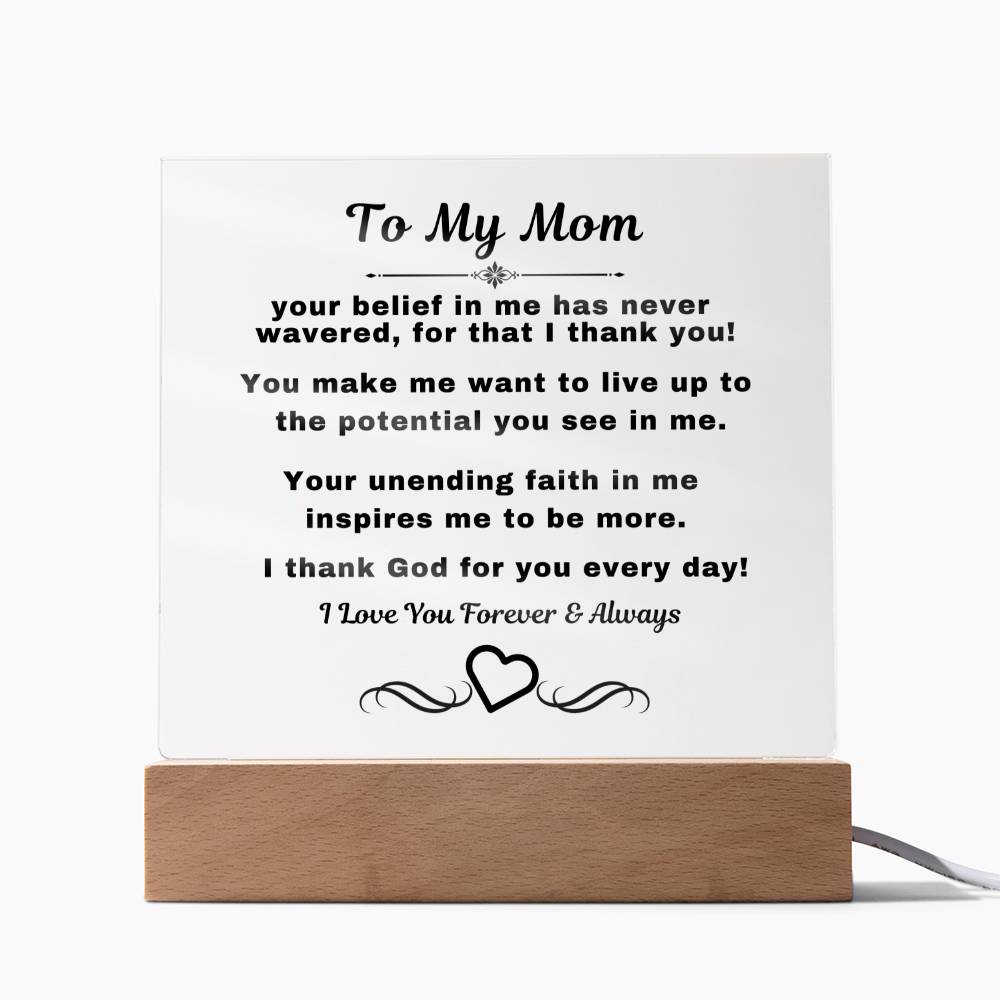 "An elegant Premium Acrylic Plaque gift for Mom displayed on a sleek Wooden Base, featuring heartfelt custom engraving to celebrate a special occasion or express your love and appreciation."