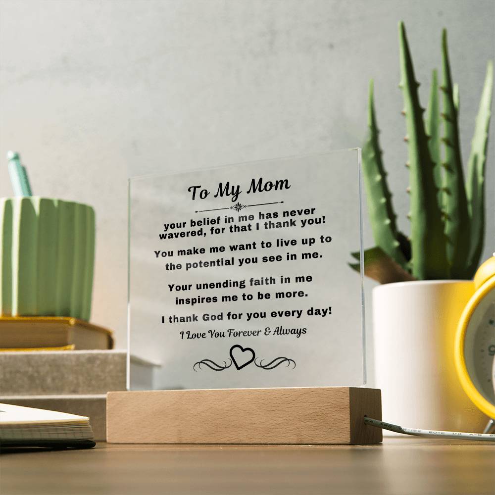 "An elegant Premium Acrylic Plaque gift for Mom displayed on a sleek Wooden Base, featuring heartfelt custom engraving to celebrate a special occasion or express your love and appreciation."