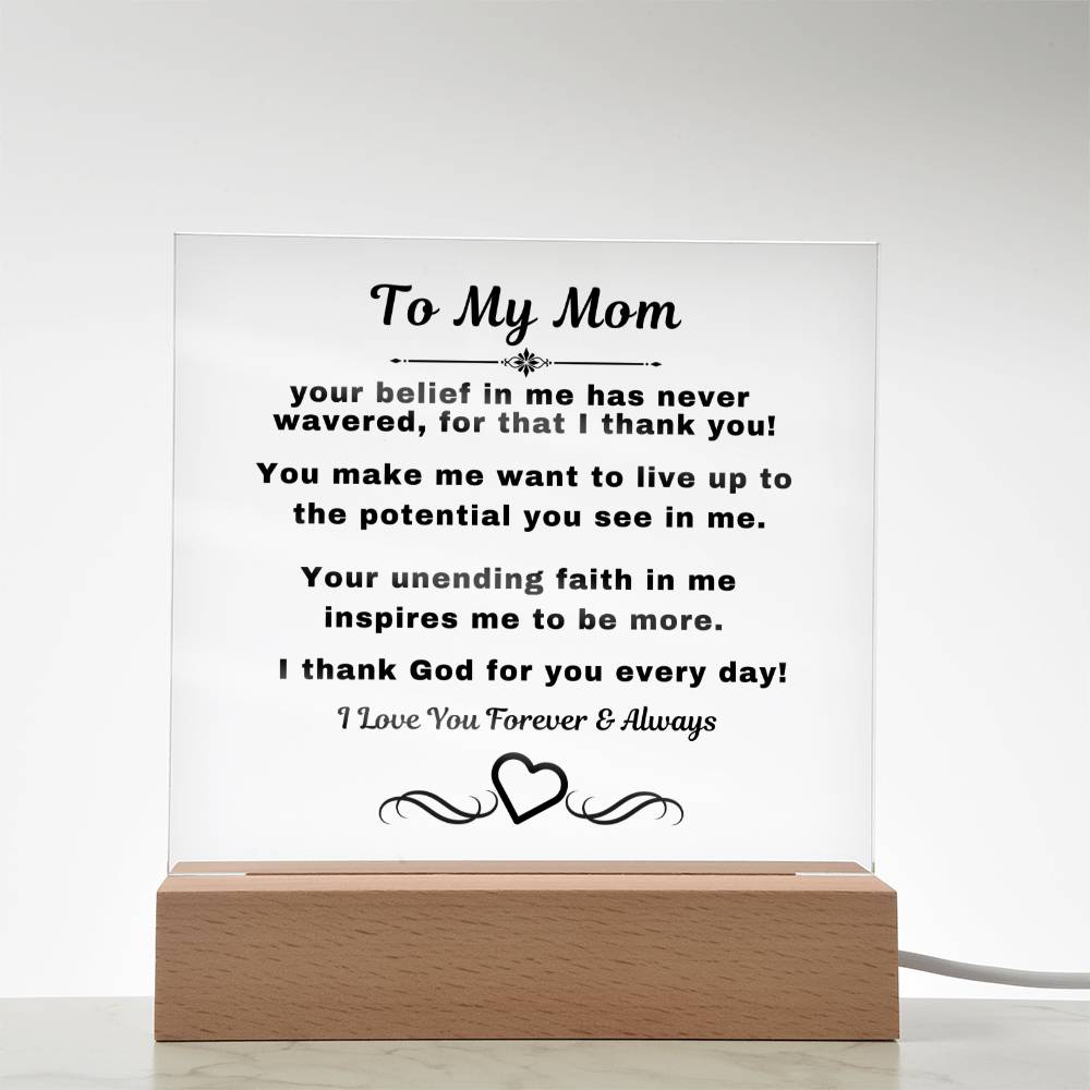 "An elegant Premium Acrylic Plaque gift for Mom displayed on a sleek Wooden Base, featuring heartfelt custom engraving to celebrate a special occasion or express your love and appreciation."