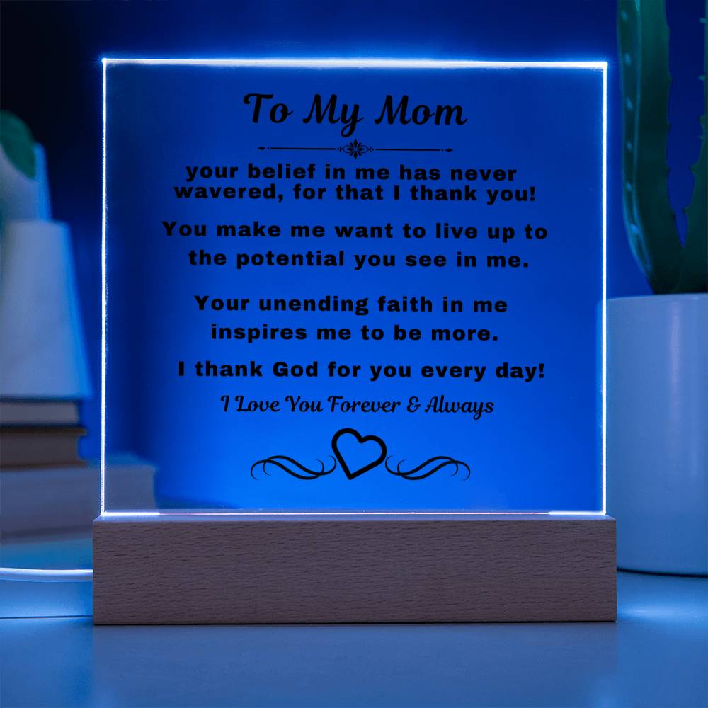 "An elegant Premium Acrylic Plaque gift for Mom displayed on a sleek Wooden Base, featuring heartfelt custom engraving to celebrate a special occasion or express your love and appreciation."