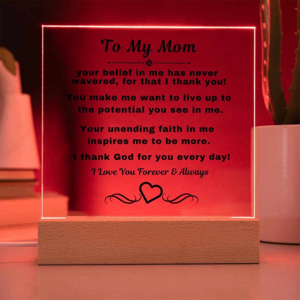 "An elegant Premium Acrylic Plaque gift for Mom displayed on a sleek Wooden Base, featuring heartfelt custom engraving to celebrate a special occasion or express your love and appreciation."